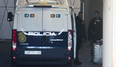 Chegada o vehículo policial á Audiencia Nacional (EFE/Borja Sánchez Trillo)