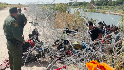 Dous migrantes morreron ao tratar de cruzar o río Grande, un deles un neno de tres anos