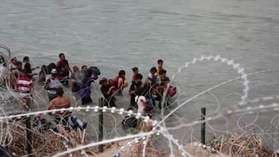 Dous migrantes morreron ao tratar de cruzar o río Grande, un deles un neno de tres anos