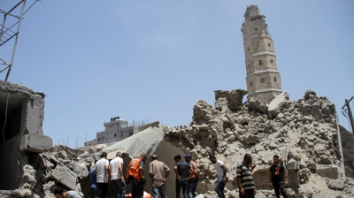Edificios destruídos no mercado da zona vella na cidade de Gaza. REUTERS/Mahmoud Issa